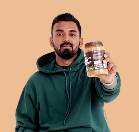K.L Rahul holding Alpino Peanut Butter