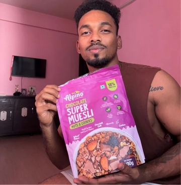 Vikram Joshi holding Alpino Super muesli